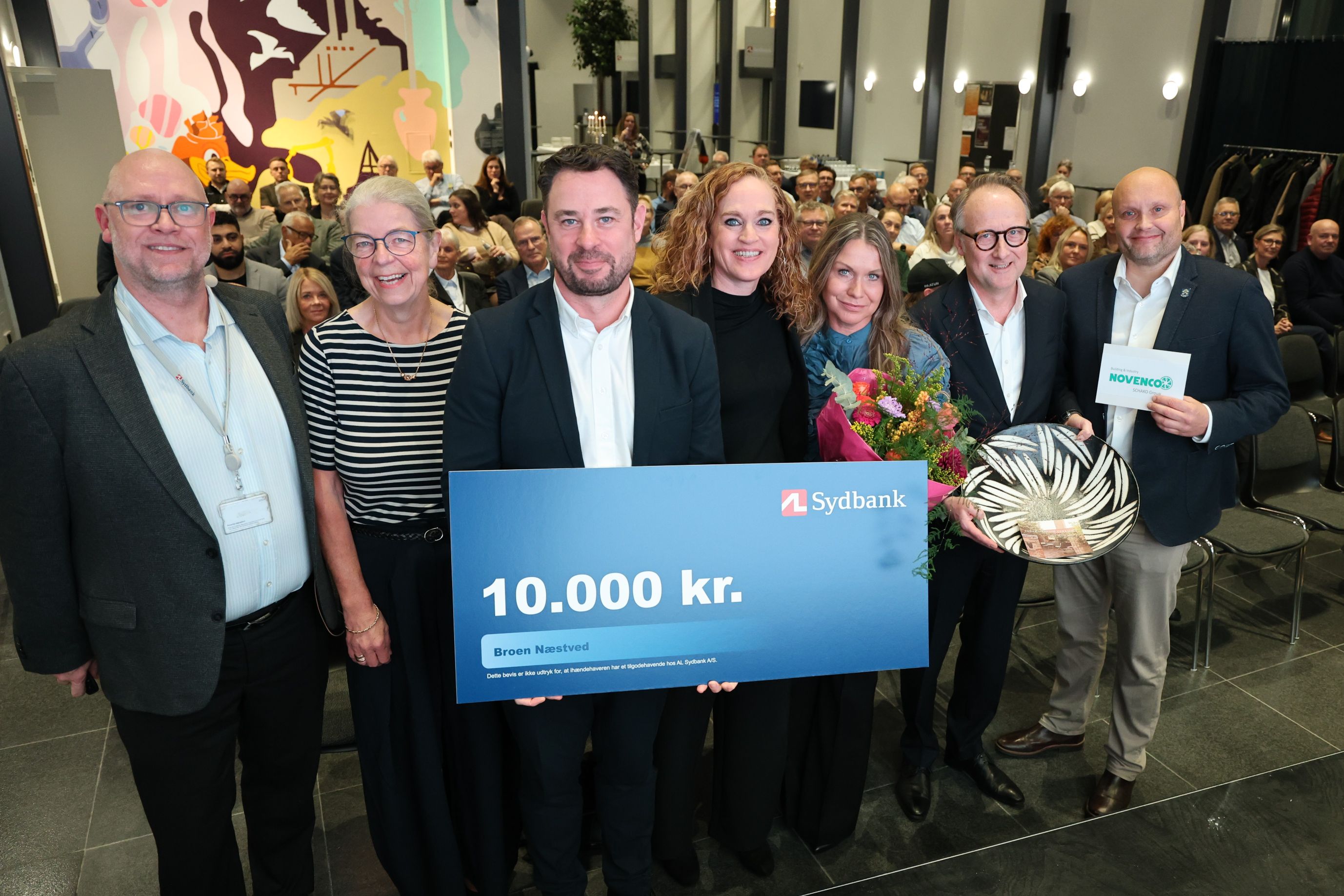 Fra venstre er de AL Sydbanks Kasper Bæk, Helle Andresen fra Næstved Erhvervsforening, Steffen Rasmussen, Charlotte Bach Petersen, Katarzyna Toepler og Lars Erik Knaack fra Novenco samt borgmester Kenneth Sørensen. Foto: John Ringstrøm